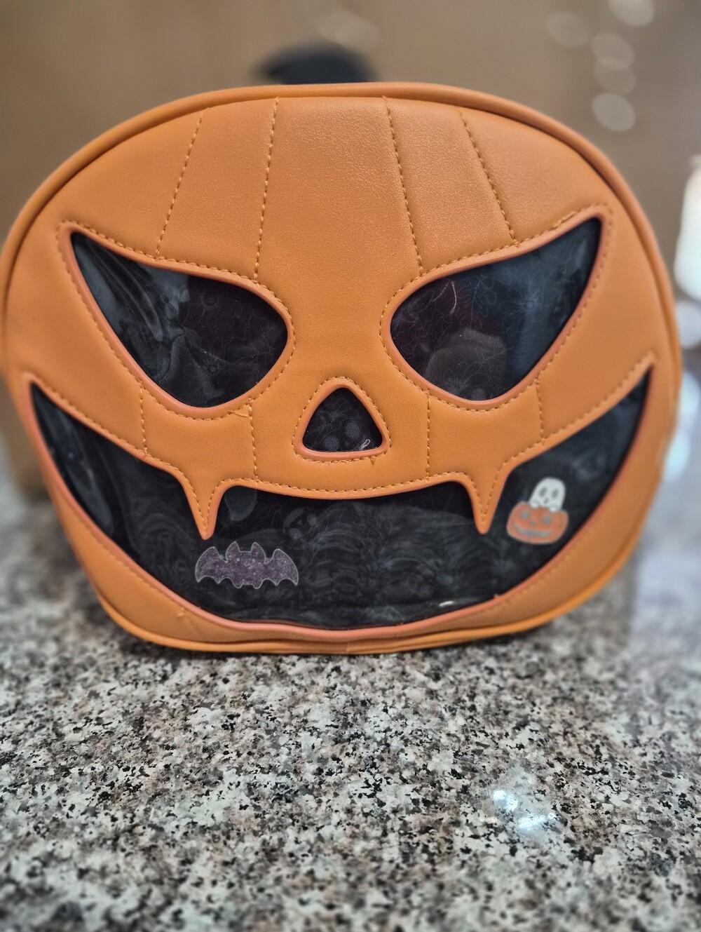 Orange Pumpkin Face Bag to Display Your Favorite Pins.